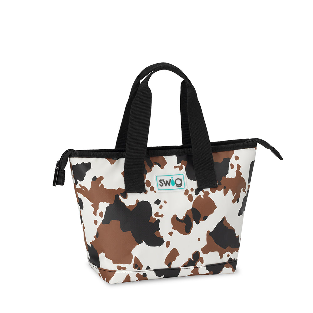 A foldable lunch bag with a cowhide print design, featuring a zipper top closure and black handles.