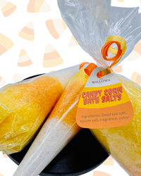 Bath salts with candy corn packaging on a colorful background