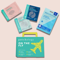 Collection of Patchology facial mask packages on a light pink background