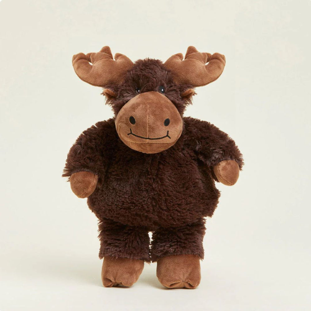 Plush moose toy on a beige background